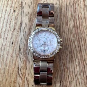 Michael Kors Rose gold wrist watch. Needs new battery.